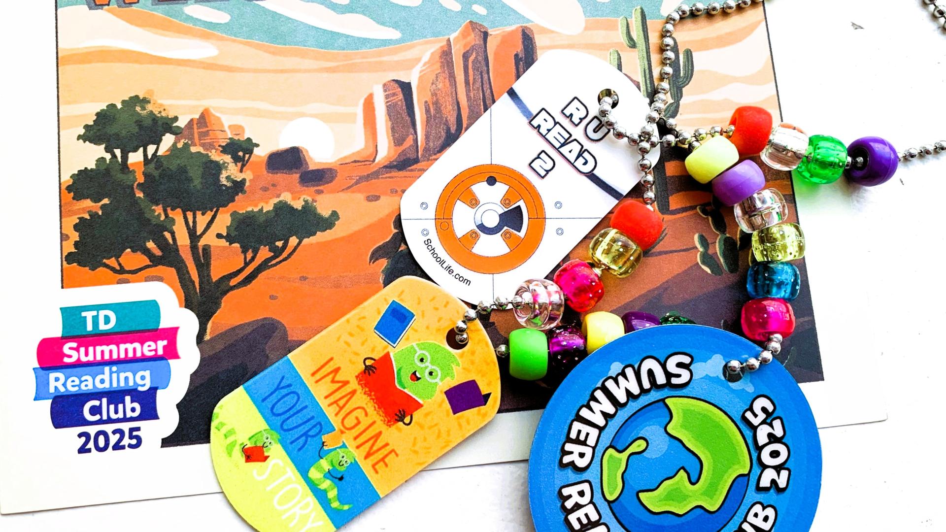 Dog tags for kids on a chain necklace lying on top of a postcard that says Welcome to the Club