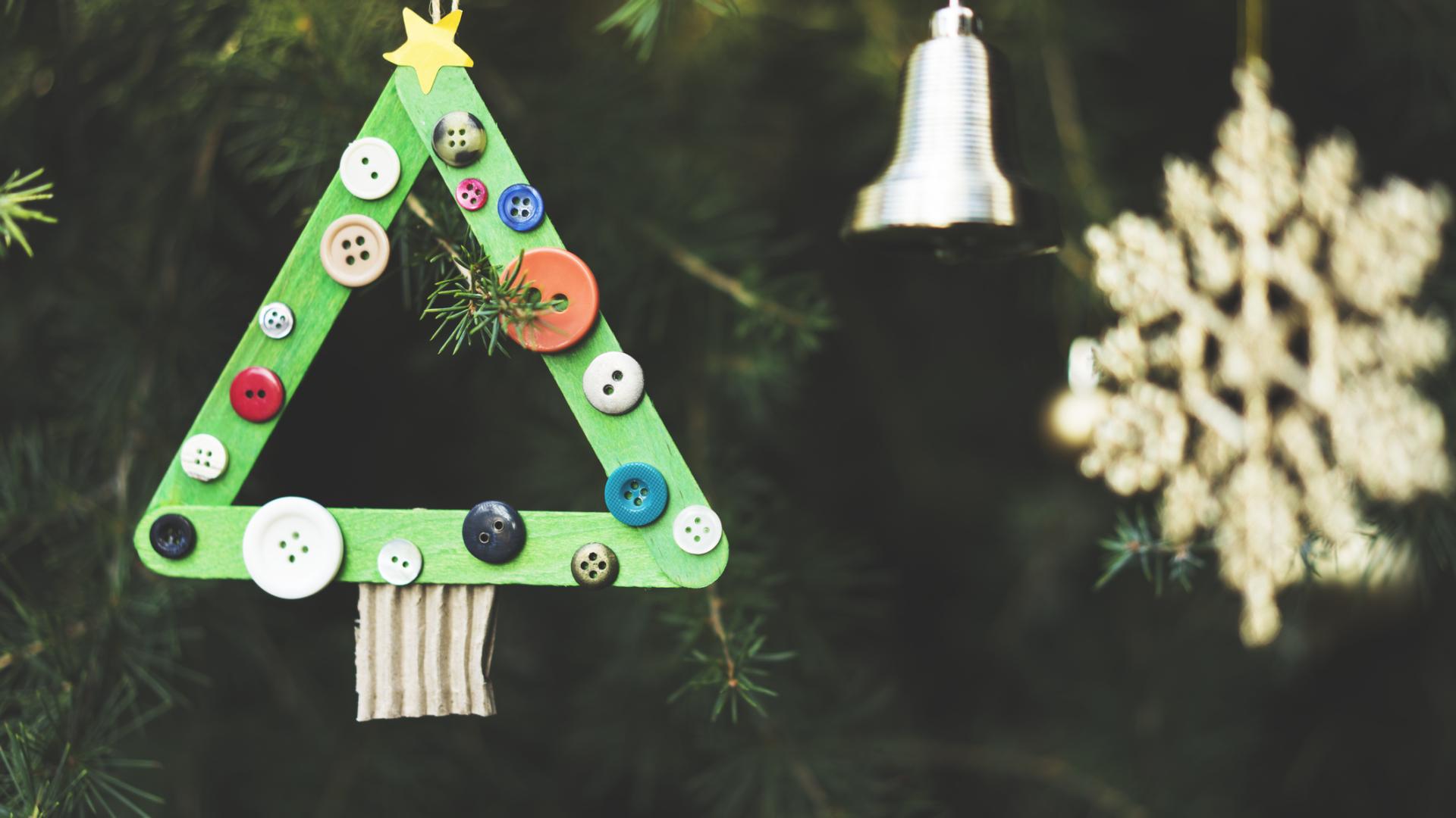 Christmas tree ornament made from buttons and craft sticks