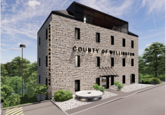 Architect's drawing of a four-story stone building with a glassed-in top floor and County of Wellington lettering on the front