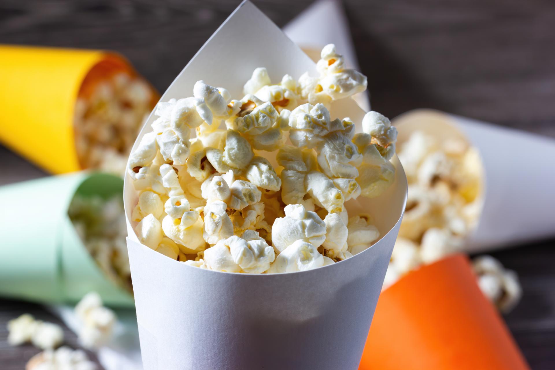 Close up of popcorn in colourful paper cones